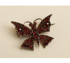 Brož ve tvaru motýla osazena granáty